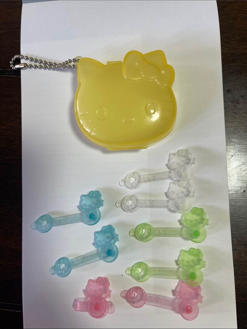 Vintage Sanrio Hello Kitty Yellow Case with Assorted Pastel Clips